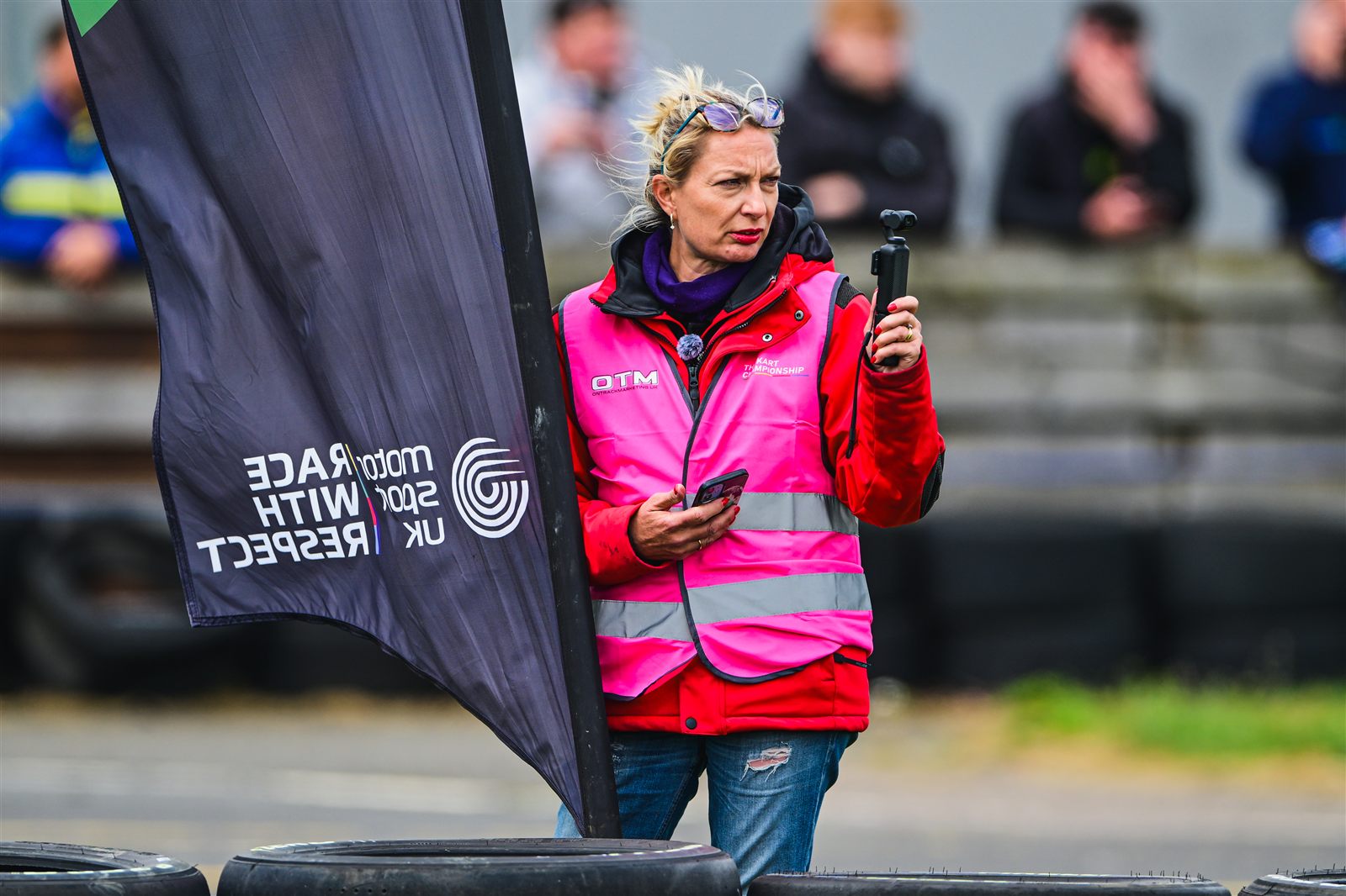Emma filming trackside for the Zenico Racing YouTube channel